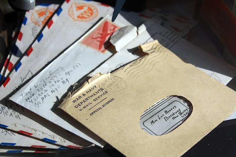 Opened envelopes representing email authentication and DMARC