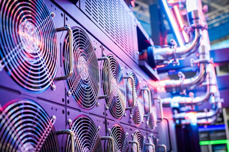 Close-up of server cooling fans in a data centre, representing shared hardware in a multi-tenant edge runtime